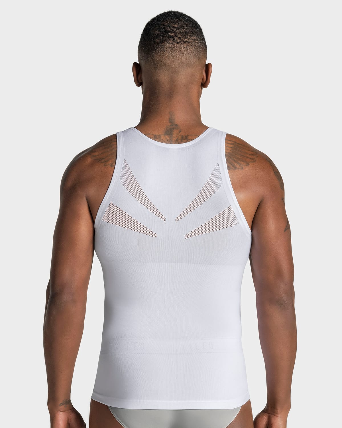 Camiseta ajustada para hombre de compresión suave en microfibra#color_000-blanco