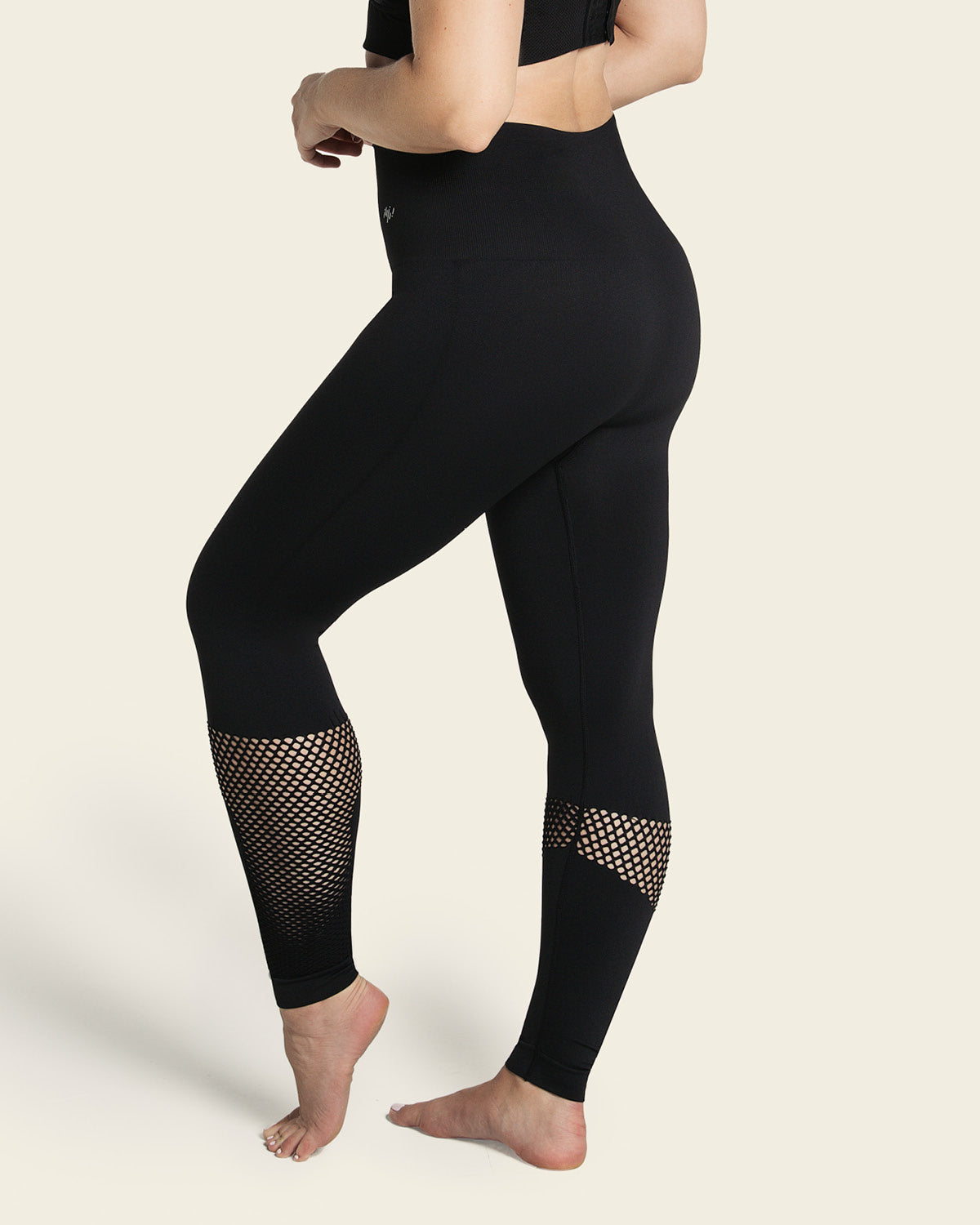 Legging deportivo de tiro alto sin costuras con fajón doble tela en cintura y mallas transpirables#color_700-negro