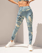 Legging de tiro alto control en abdomen y muslos en material pet reciclado#color_086-estampado-azul-marfil